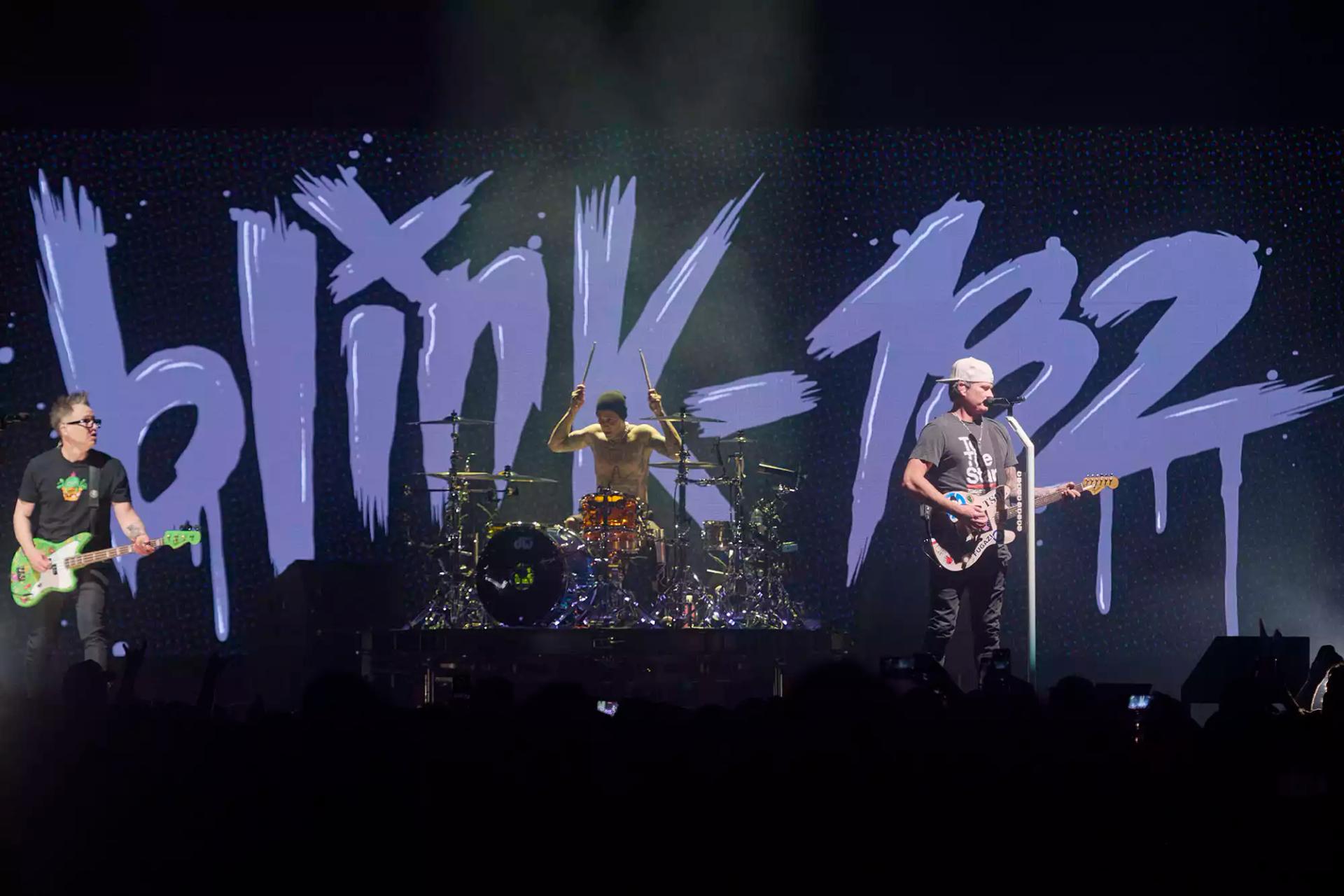 Blink-182 Tickets + Travel – Live Concert Blink-182 performing live on stage at a concert – Blink-182 Tickets + Travel